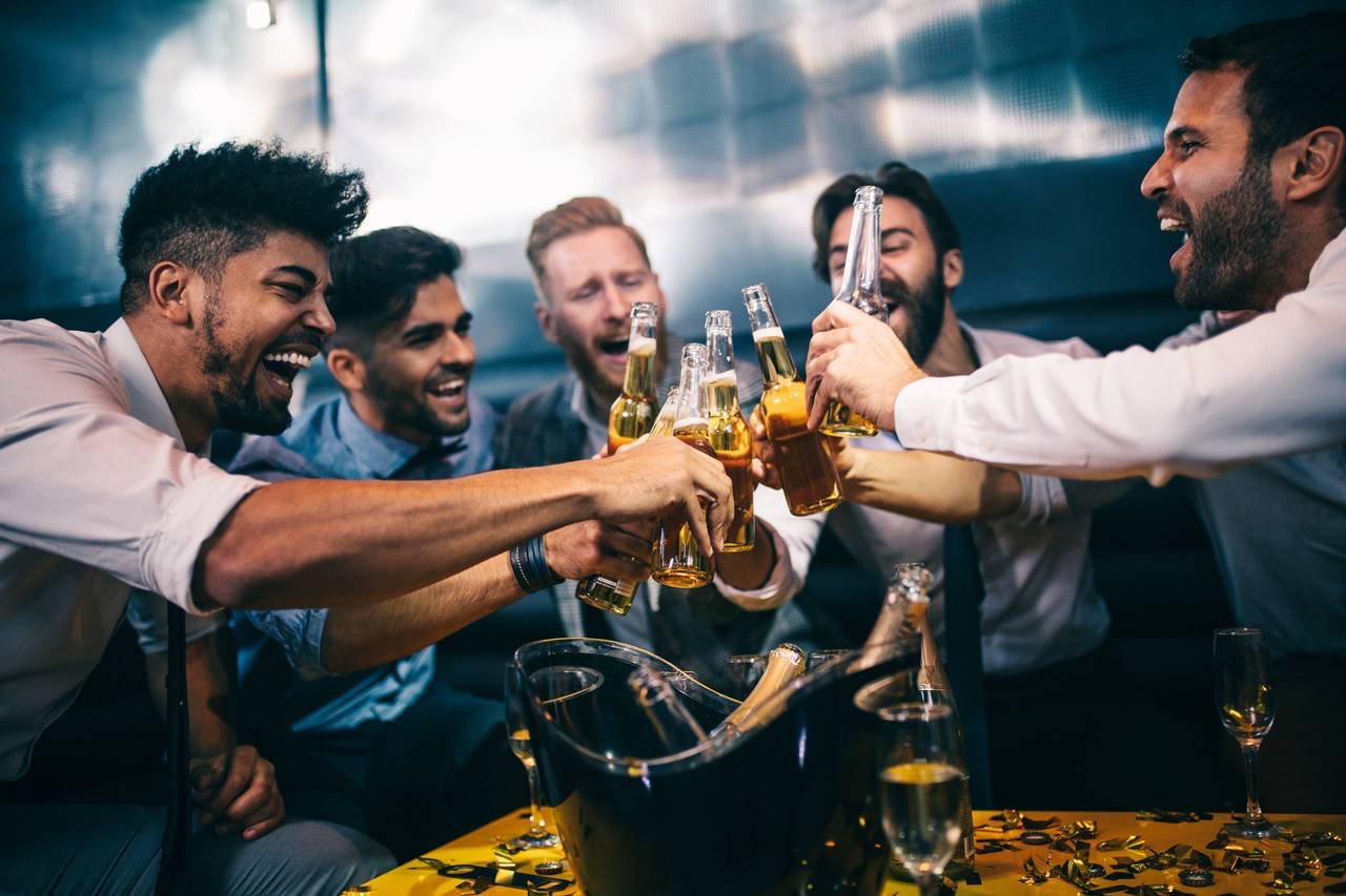 Friends toasting in a beer hall